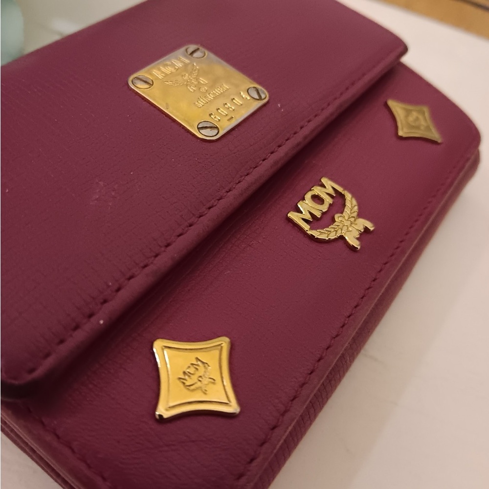 MCM trifold wallet with gold hardware and MCM AUTHENTIC charm - Picture 7 of 8